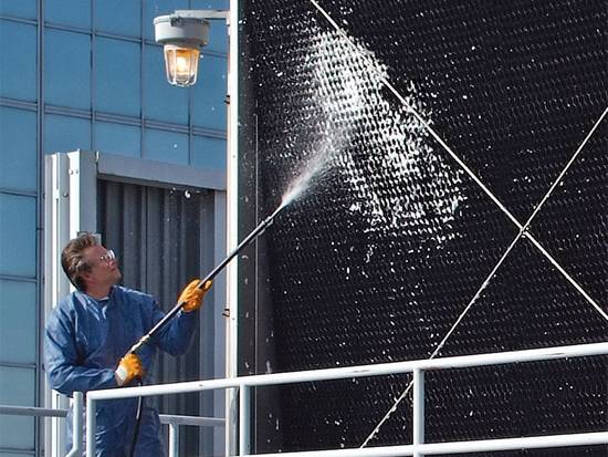 Cooling tower fill cleaning and visible buildup removal